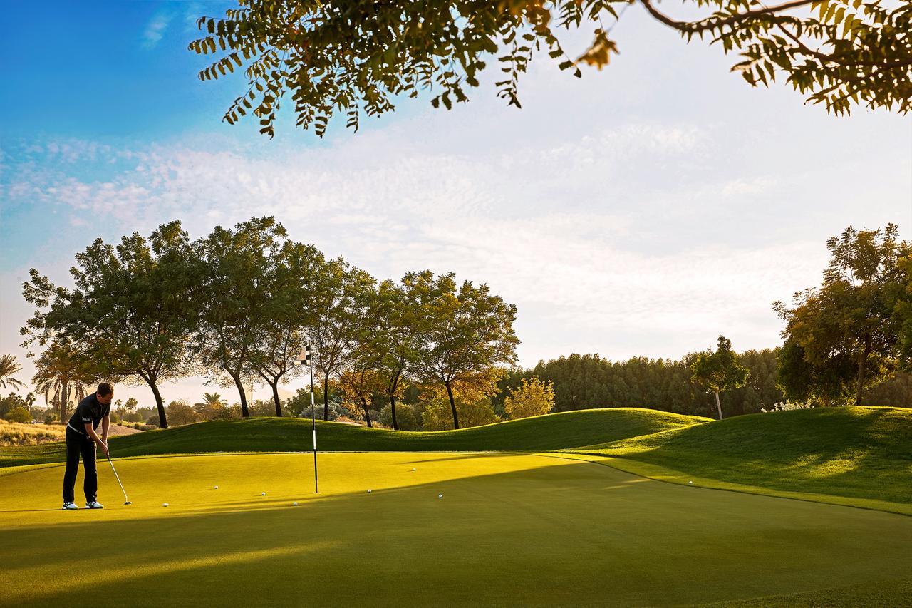 The Meydan Hotel Dubai Exterior foto Golf course at the resort
